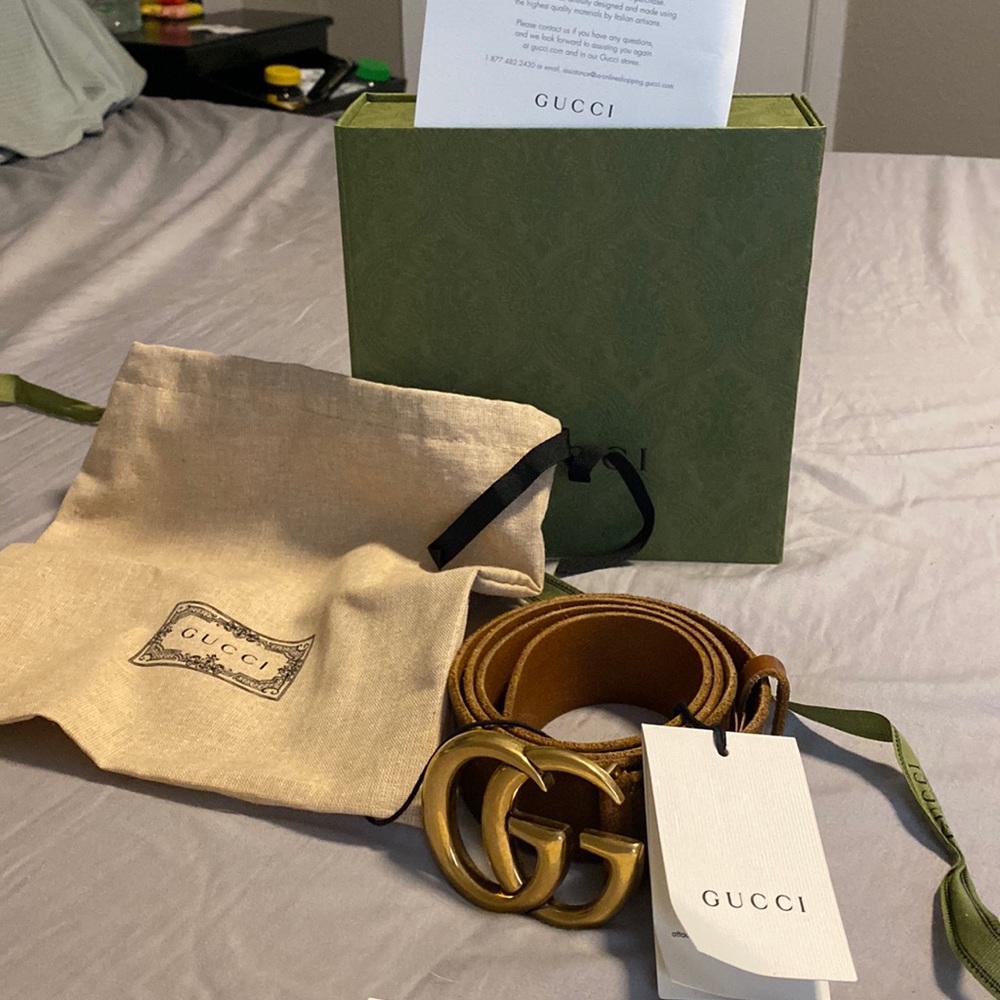 Gucci belt with big buckle.